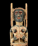cc27a: Malangan Figure. Wood, pigments, shell. H: 23.25" (59 cm). Early to mid 20th century, New Ireland.